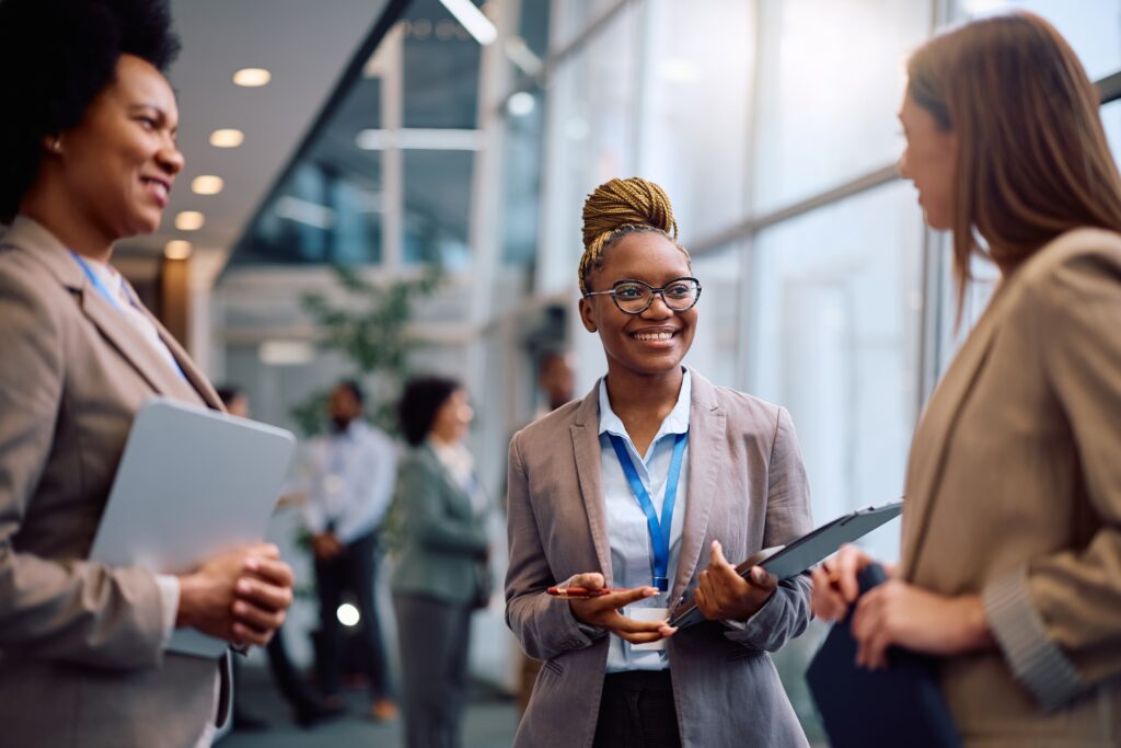 A young professional having a positive conversation with a prospect.